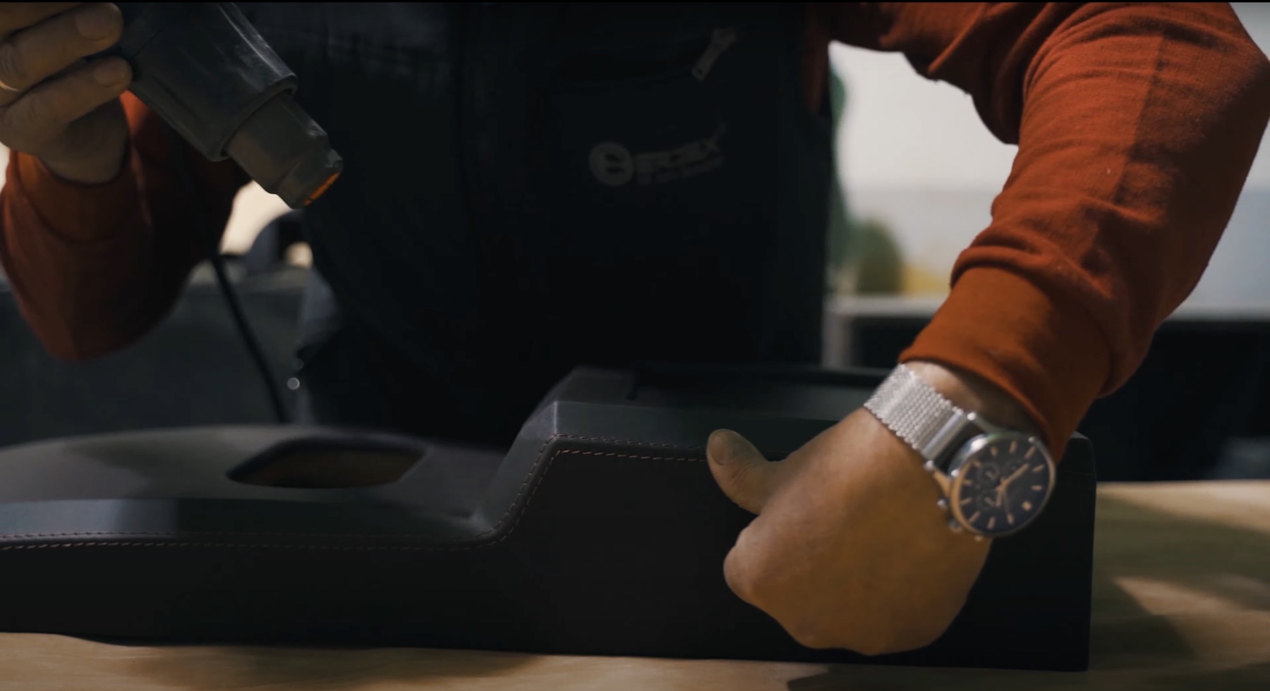 Hand finishing an Ertex bespoke leather component