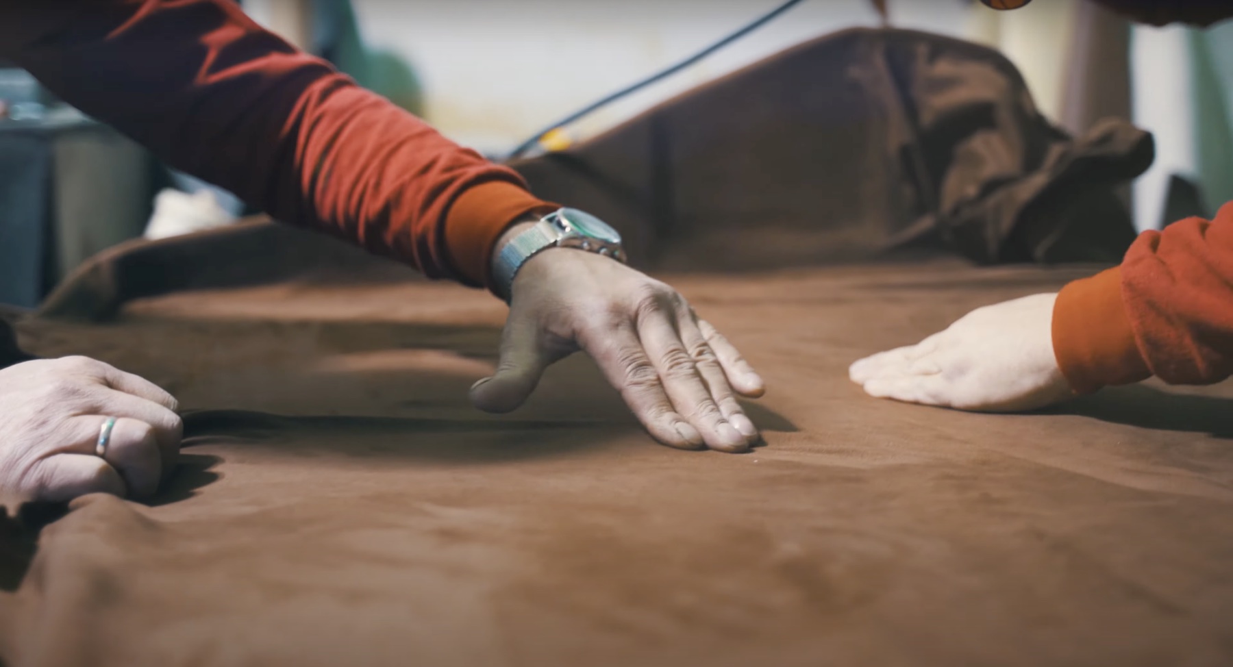 Ertex artisans shaping bespoke upholstery material